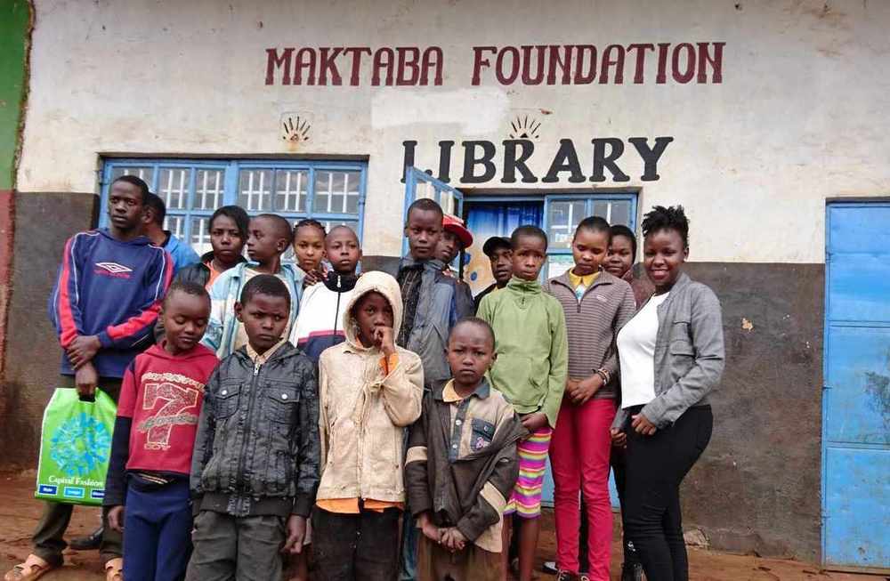Maktaba team with library attendants